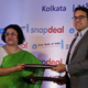 State Bank of India chairman Arundhati Bhattacharya, left, and Snapdeal CEO Kunal Bahl exchange agreement papers in Kolkata.